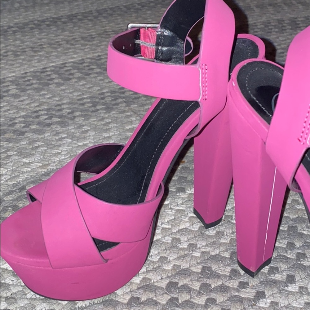 Size 6 fuchsia strappy heels. Worn once